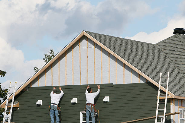 Professional Emergency Siding Repair technician working in Stony Brook, NY